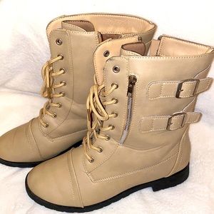 Tan winter boot with Buckles and lace up design